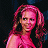 A 48x48 pixel buddy icon featuring a stylized image of a woman with long wavy hair on the left and green text reading "Original Icons .com" on the right against a dark background.