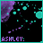 Pixelated icon with purple and cyan elements on black background, displaying 'ASHLEY.' text at bottom.
