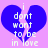 Pixelated blue heart split into two halves on pink background with white text reading 'i dont want to be in love' across both halves.