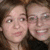 Two people in a close-up photo on the left, with blue and gray text on the right reading "OMG ERIN!" and "YOU HAVE BUNKBEDS?"