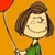 Pixelated cartoon character with brown hair, green shirt, and red balloon on orange background.