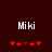 Two side-by-side pixelated displays of 'Miki' text above red heart symbols on a dark background, with the hearts shifting position between frames.
