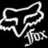 White pixelated line drawing of a fox head silhouette with stylized ears and tail on black background, accompanied by lowercase 'fox' text in matching style.