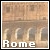 Static pixelated image of a classical building facade with columns and arches, labeled 'Rome' in white text at the bottom.