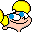 Pixelated cartoon character with yellow hair, blue eyes, and peach skin holding a yellow object against gray background.