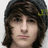 A pixelated image shows a person with brown hair and a dark beanie, next to a heart outline containing the text "Mitchy" in bold black letters.