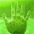 Green pixelated hand with five fingers extended against a gradient green background, rendered in low-resolution digital style.