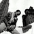 A black-and-white animated sequence showing a person in motion with of the same figure
