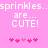 Pixelated pink background with repeated white text and heart symbols, animated to shift positions.