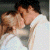 A 50x50 pixel animated buddy icon showing a couple kissing on the left and green text "Original Icons .com" on the right, with visible pixelation and dithering effects.