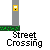 Animated contact sheet showing a yellow stick figure character crossing a street with traffic lights, cars, and text changes across 17 frames.