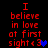 Red pixelated text on black background reads 'I believe in love at first sight <3' with a blue heart symbol, showing animation changes between frames.