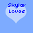 Pixelated blue text on a light blue heart shape against a solid light blue background, with variations in the text content across frames.