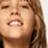 A pixelated image of a person with light brown hair and a bright blue background, featuring partial text reading 'my future husband' in black block letters.