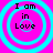 Four identical circular cyan rings on a bright pink background, each containing the text "I am in Love" in black pixelated font.