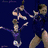Animated sequence showing a gymnast in blue leotard performing flips and poses against dark background, with static images of two people smiling and a person in red top.