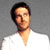 Static 50x50 pixel icon showing a person with dark hair and light skin wearing a white shirt against a gray background, rendered in low-resolution pixel art style.