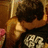 Pixelated image of two people embracing with text overlays reading 'kiss me.', 'hold me.', and 'touch me.' on a black background.