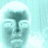 Pixelated face with light blue and white tones, featuring a rounded head shape and dark vertical line for the nose.
