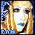 Pixelated portrait of a person with long blonde hair, blue eyes, and blue lips against a blue background with partial text "FAH" at the bottom.