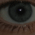 A 2x2 contact sheet of four animated frames showing close-up eyes and text elements with pixelated pink lettering on black backgrounds.