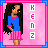 Pixel art of a woman with long dark hair in blue top and pink skirt, standing against pink background with vertical text "KENZ" on left side.