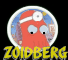 Red cartoon character with large blue eyes and white headgear, wearing a red body covering, set against a cityscape background with yellow text below.
