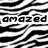 Black and white zebra-stripe pattern with partial text reading 'amazed', 'by', 'U!', and a gray square in the bottom right.