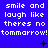 Blue background with white pixelated text repeating 'smile and laugh like there's no tomorrow! tomorrow! tomorrow!' in three , with small black symbols between