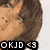 Six distinct poses of a person with dark hair in various outfits and backgrounds, each labeled "OKJD <3" at the bottom.