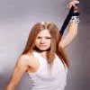 A woman with long brown hair wears a white tank top and black choker, raising her right arm while green text 'DO IT' appears on the right side of the image.