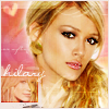 A static image of a person with light brown hair, wearing large gold earrings, against a pink and orange gradient background with a small inset photo.
