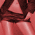 A 2x2 contact sheet of four animated frames showing a woman in a dark red dress with visible cleavage and thigh, featuring the text "BRITNEY SPEARS" at bottom right.