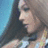 Pixelated image of a person with long brown hair on left, blue background with 'LOVE' text and heart symbols below.