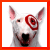 A 2x2 contact sheet of a white bull terrier mascot with red target logo on its forehead, displaying four different text captions above the dog's head across sampled frames.