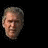 Four identical pixelated head portraits of a man with short gray hair arranged in a on black background, each showing subtle variations in facial expression and lighting