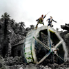 Two figures stand atop a large, metallic, spherical structure with visible grid lines and green accents, set against a rocky, forested background.