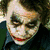 Three side-by-side show a character with white face paint, red lips, and dark hair in various poses against different backgrounds