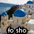 Pixelated image of a blue-domed building with stone walls and a blue sea background, labeled 'fo sho' at the bottom.