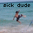 Pixelated image of a person in mid-air with arms outstretched against a beach background, overlaid with black text reading 'sick dude' in a blocky font.