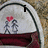 A circular icon with a white top and maroon bottom shows two gray stick figures holding hands under a red heart, with text changing from 'I' to 'Love' to 'you'.