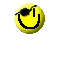 Two yellow pixelated smiley faces with black eyepatch and mouth, side-by-side on gray background; text 'chistes' below right face.