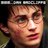 A pixelated image of a person with round glasses and dark hair, wearing a striped shirt, overlaid with text in