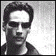Black-and-white of six showing a person with dark hair and sunglasses, each displaying sequential text that spells 'MATRIX' vertically on the right
