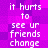 Pixelated text repeats on a purple and pink gradient background with no visible animation changes.