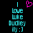 Pixelated cyan text on black background with pink heart symbol above, showing two identical static frames of 'I love Luke Dudley' and smiley face.