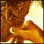 Pixelated animation of a figure with a white hat and mustache transitioning through multiple facial expressions and poses against a brown background.