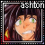 Pixelated image of a person with green eyes and dark hair, framed by a border with the text 'ashton' at top right.