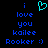 Pixelated blue text on black background with cyan heart symbol above 'i love you kailee Rooker :)'.