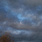 Pixelated blue-toned image with layered cloud-like shapes and subtle light gradients, no distinct subjects or text visible.